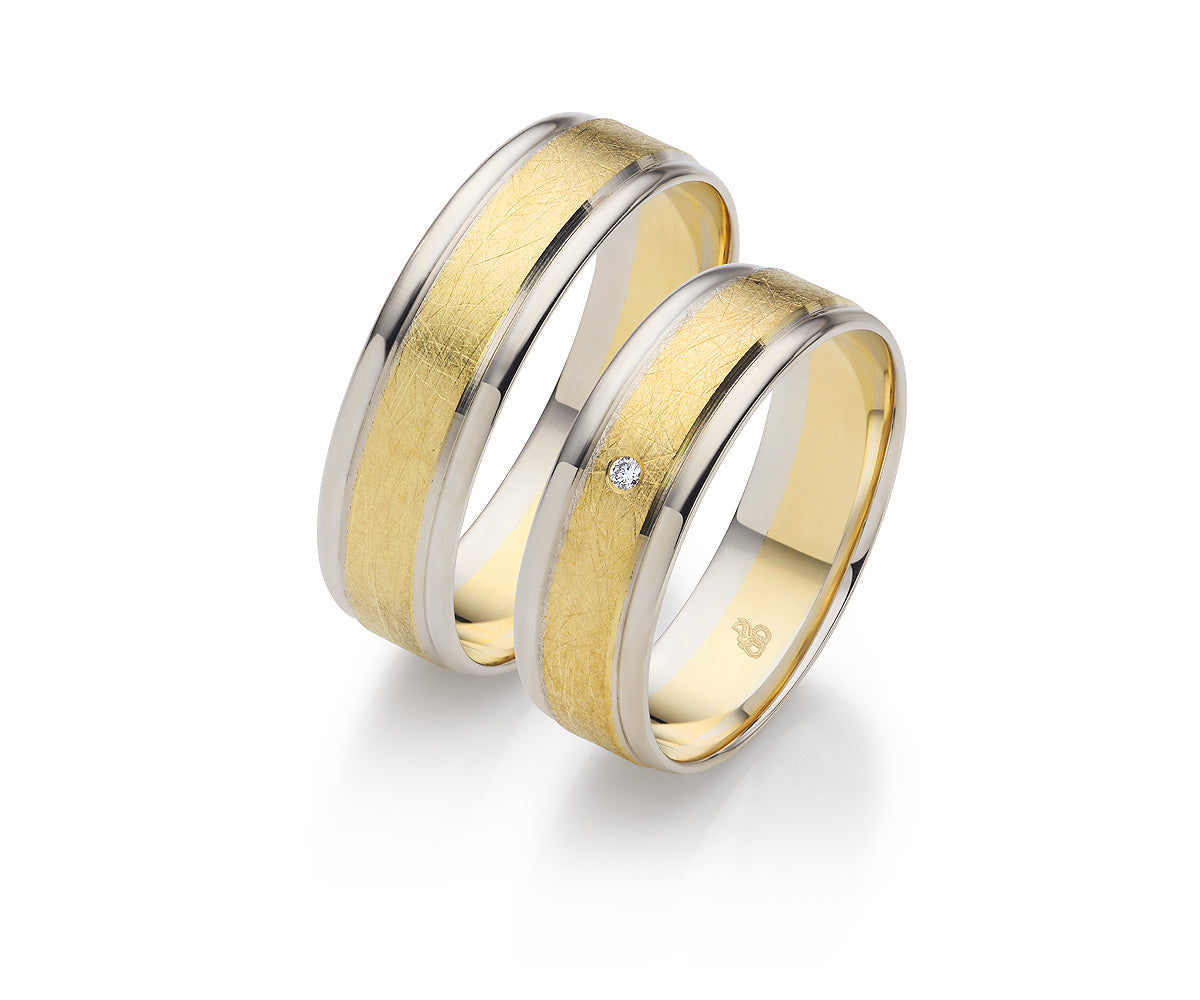 Desire Bicolor Eheringe - Goldene Verbindung zweier Herzen auf eheringkaufen.ch erhältlich