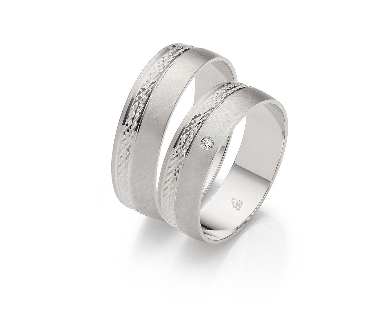 Desire Whitegold Eheringe - Zwei Herzen, ein Band auf eheringkaufen.ch erhältlich.