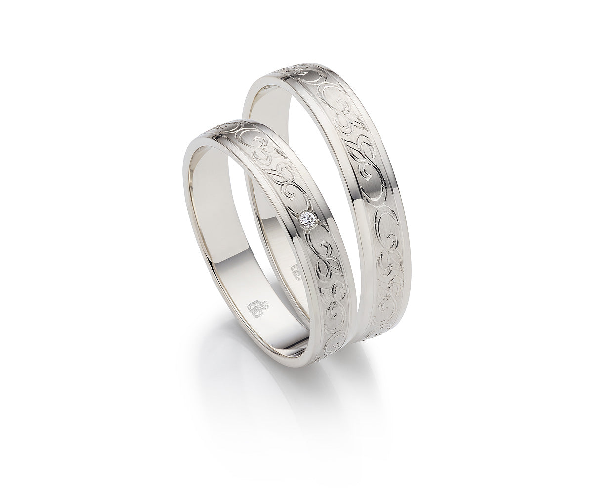 Desire Whitegold Eheringe - Zwei Herzen, ein Band auf eheringkaufen.ch erhältlich.