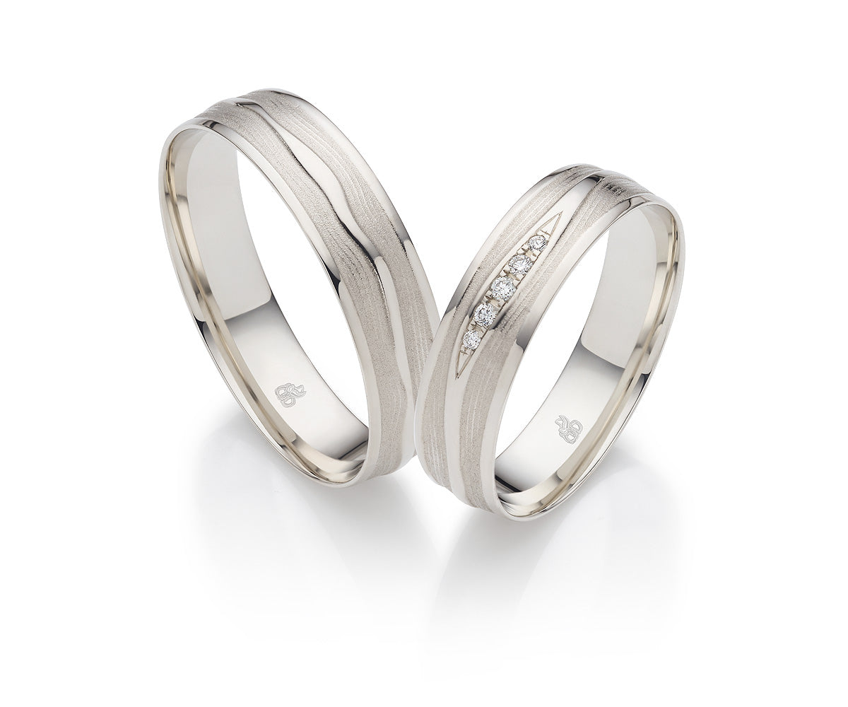 Desire Whitegold Eheringe - Zwei Herzen, ein Band auf eheringkaufen.ch erhältlich.