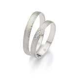 Desire Whitegold Eheringe - Zwei Herzen, ein Band auf eheringkaufen.ch erhältlich.